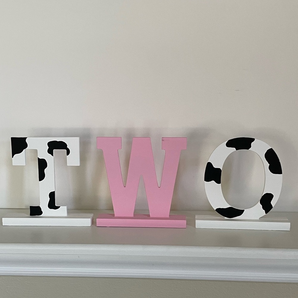 TWO hand painted wooden letters